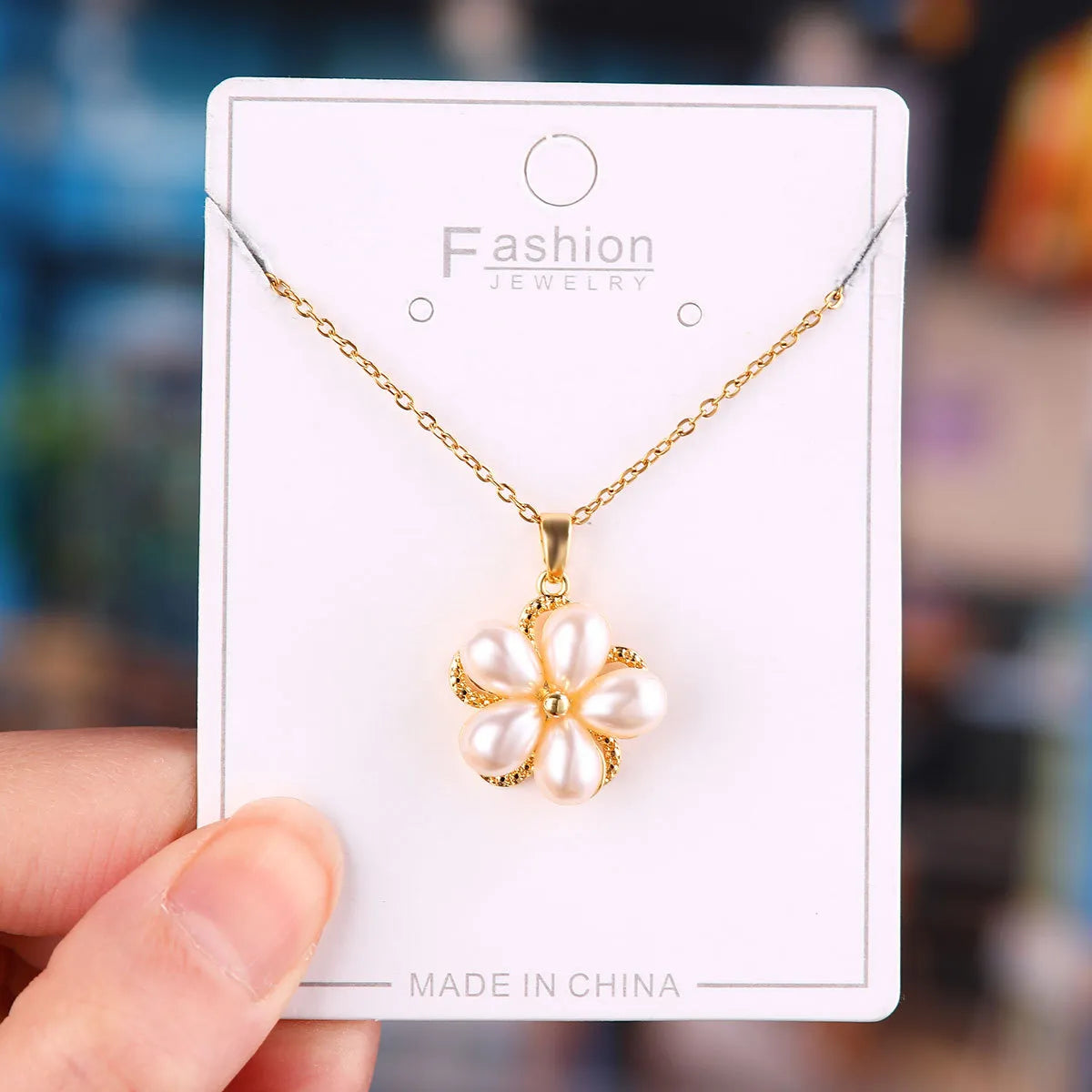 X5785# Rotating Pearl Five Petal Flower