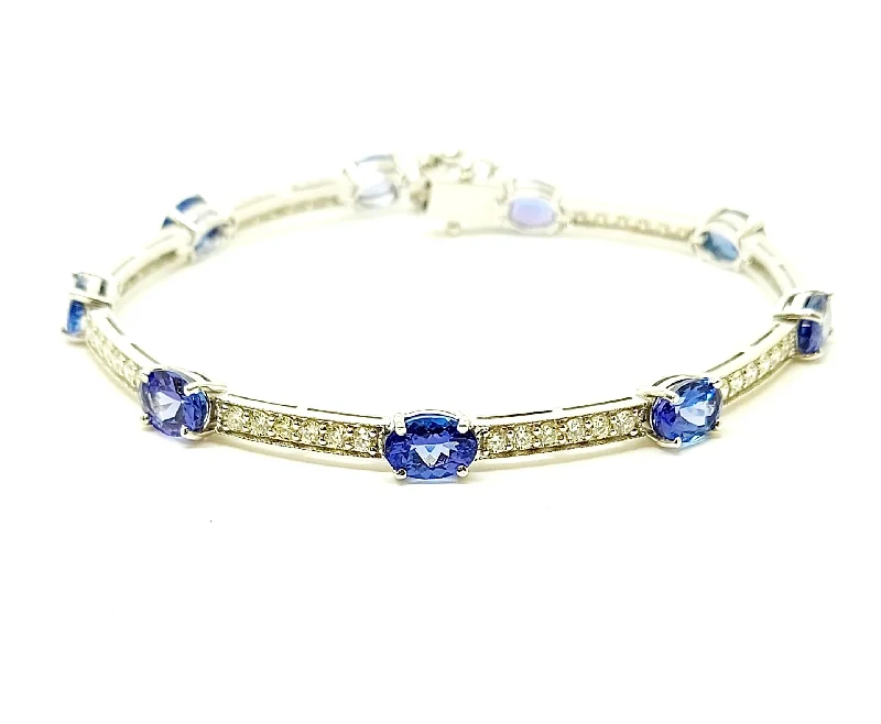 Custom Bracelets for Couples-TANZANITE AND DIAMOND STATION BRACELET IN 14K WHITE GOLD AD NO # 2709