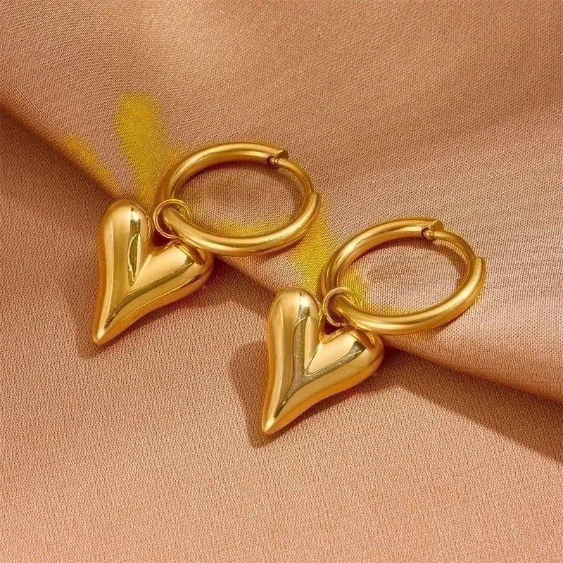 Gold stud earrings