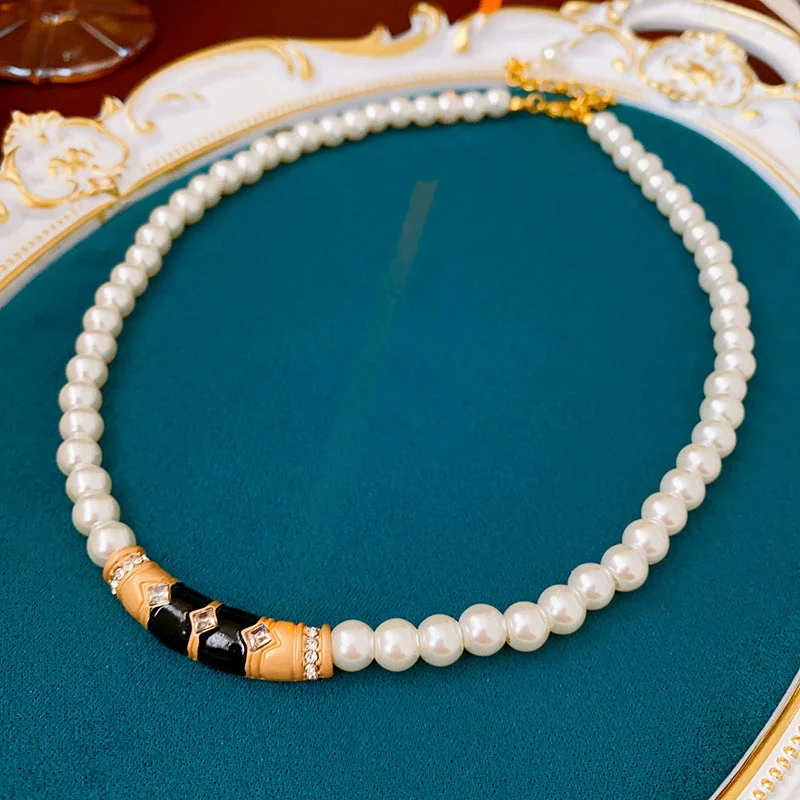 34 # Necklace - Golden Arc Pearl