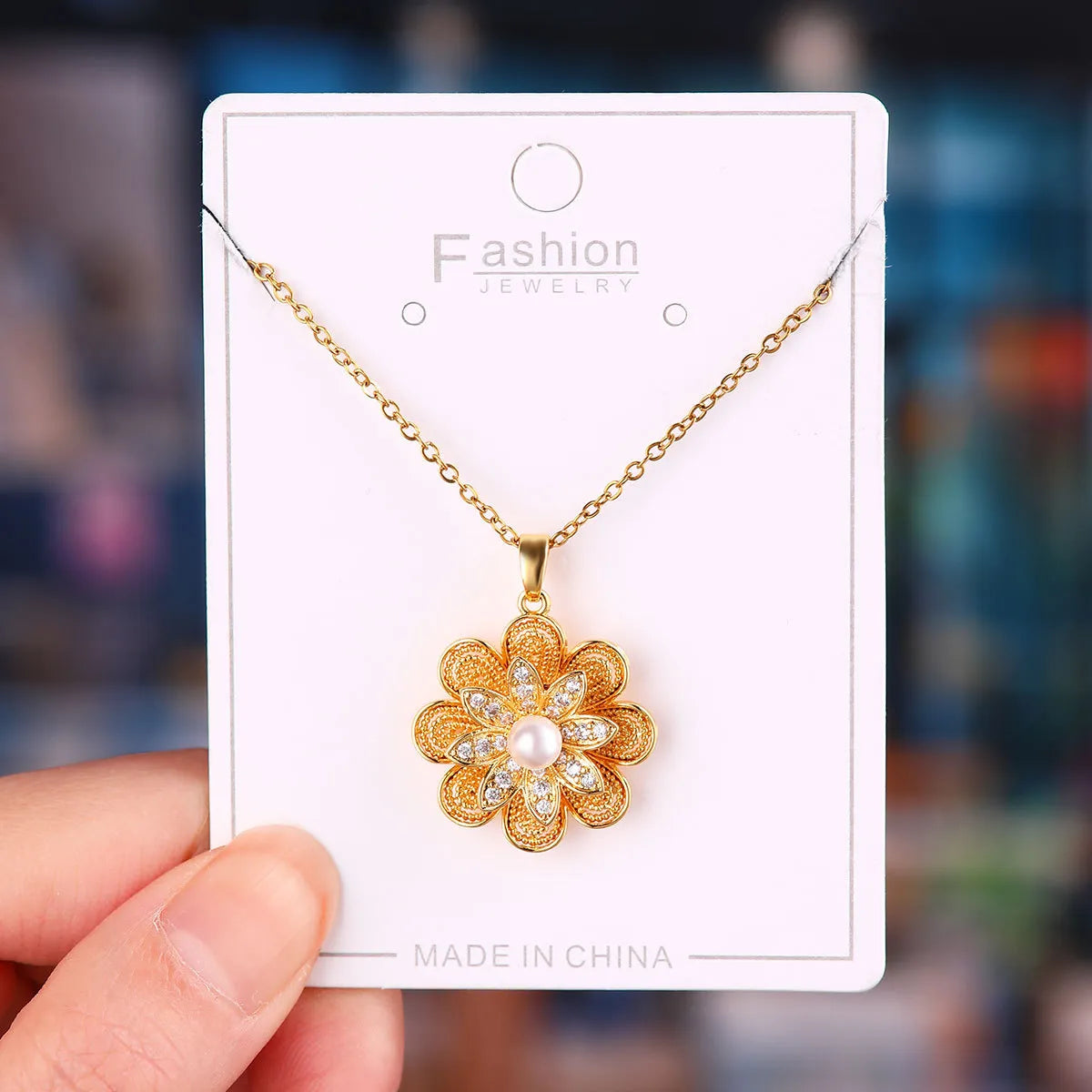 X5787#-1 Golden Rotating Pearl Hollowed-out Small Flower